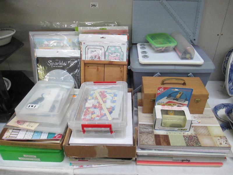 An assortment of craft items including paper etc.