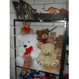 A quantity of assorted teddy bears, cushions etc.