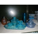 A quantity of coloured glass including an art deco perfume bottle