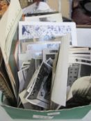A mixed lot of old photographs, postcards, a sketch book etc.