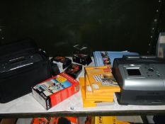 A HP and a Lexmark photo printer and quantity of photo paper, toners inkjets etc.