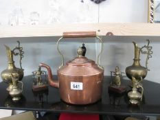 A copper kettle, [air of brass Indian ewers, brass bell,