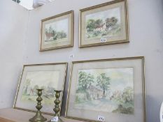 4 framed and glazed paintings of village scenes signed D.C.