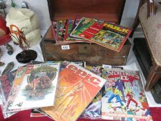 A collection of comics and magazines including Marvel, Rampage, Secret Wars, Epic,