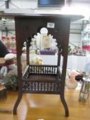 An ornate hall table/pot stand