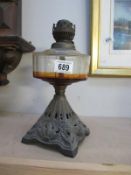 A cast oil lamp (no shade or chimney)