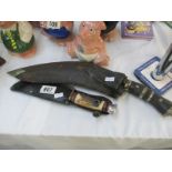 A Kukri knife and 1 other