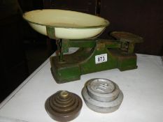 A set of old kitchen scales and weights