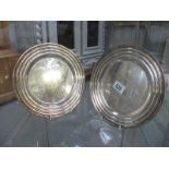 A pair of silver plated Christofle plates