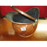 A copper coal bucket