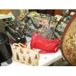A ladies holdall and vanity case and 3 handbags