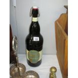 An oversize bottle of Cheddington Golden Ale