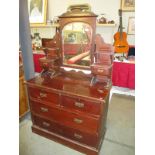 A vintage mirror backed dresser with 3 drawers