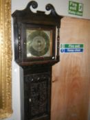 A brass faced Grandfather clock