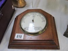 An Edwardian mahogany barometer with integral thermometer