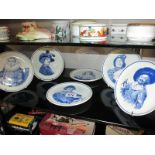 A complete set of 6 Delft blue plates depicting Jester, musketeers etc.