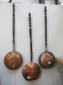 3 copper warming pans,