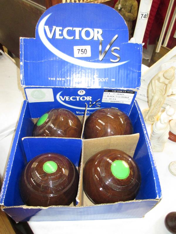 A box of Vector lawn bowls