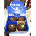 A box of Vector lawn bowls