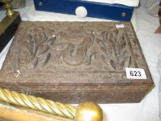 An Oriental carved wood box