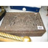 An Oriental carved wood box