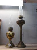 2 brass oil lamp bases and chimneys