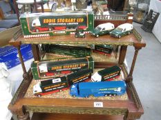 A box of Eddie Stobart trunks and cars etc.