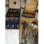 3 boxed sets of spoons and a quantity of cutlery