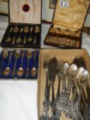 3 boxed sets of spoons and a quantity of cutlery