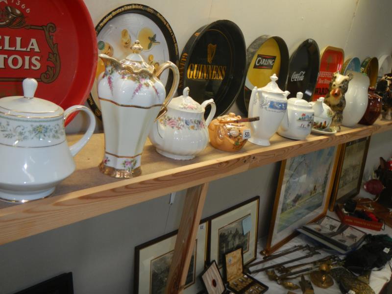 A collection of 12 teapots