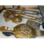 A quantity of brass items including fire items,