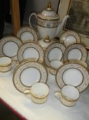 A Minton Aragon coffee set comprising 10 cups with saucers,