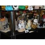 A collection of animal figurines etc