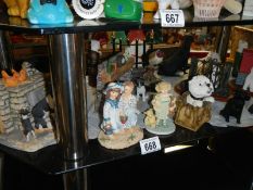 A collection of animal figurines etc