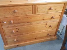 A 2 over 3 pine chest of drawers