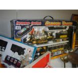 A boxed infrared control Classic Train set and a boxed Festive Express Train Set