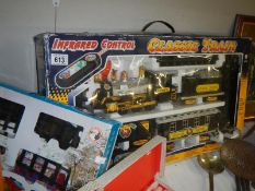 A boxed infrared control Classic Train set and a boxed Festive Express Train Set