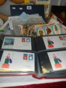 A mixed lot of stamps and cigarette cards including First Day Covers, Commemorative, Players,