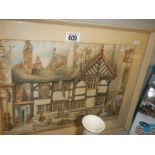 A framed and glazed picture of a medieval building