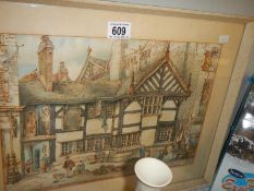 A framed and glazed picture of a medieval building