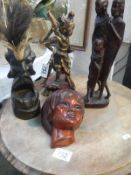 A collection of tribal figurines etc