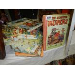 A collection of Rupert the Bear annuals and books