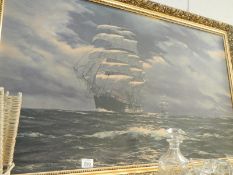 A large gilt framed nautical picture