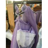 3 purple bridesmaids skirts and tops