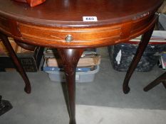 A d-end table with drawer