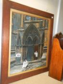 A framed and glazed picture of Choristers and Cathedral door