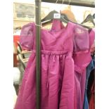 2 magenta bridesmaids dresses and a flower girl dress