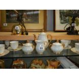A 6 setting Continental lustre tea set with teapot,