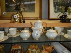 A 6 setting Continental lustre tea set with teapot,