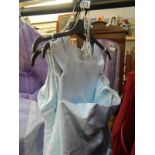 2 cyan bridesmaids dresses and a flower girl dress